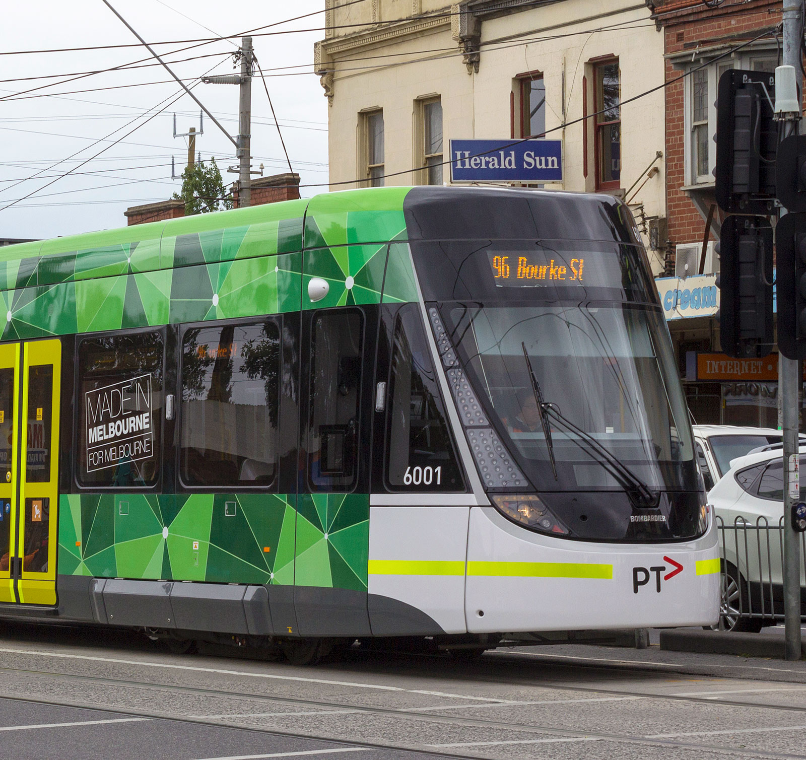 Image of the Route 96 tram travelling along Nicholson Street