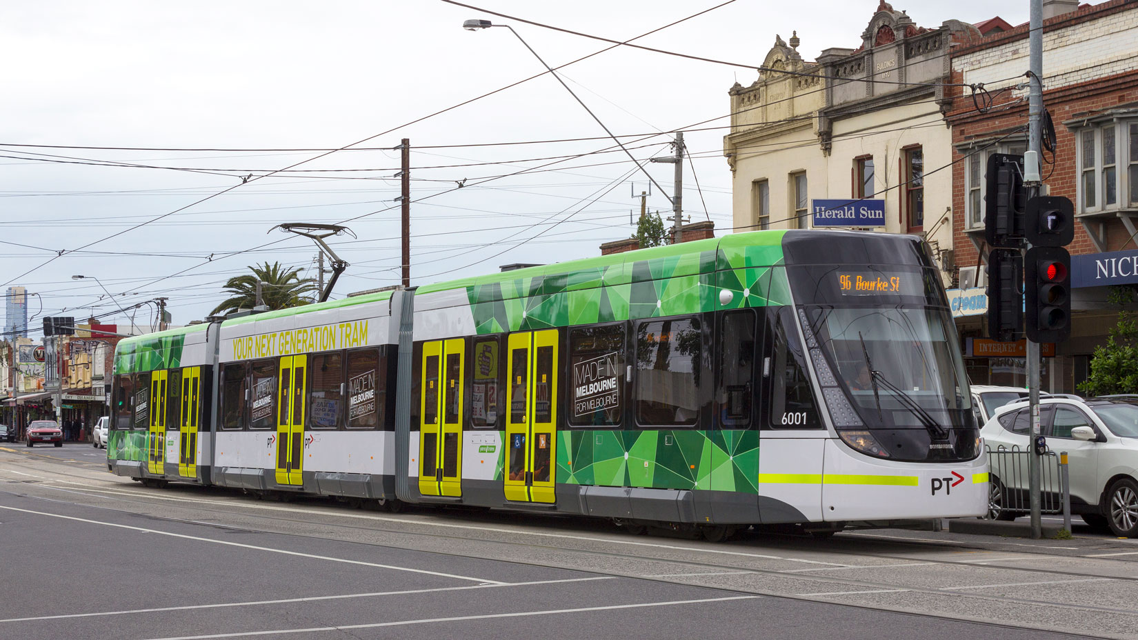 An image of the Route 96 tram travelling along Nicholson Street