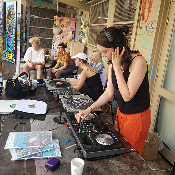 young women djing at event 