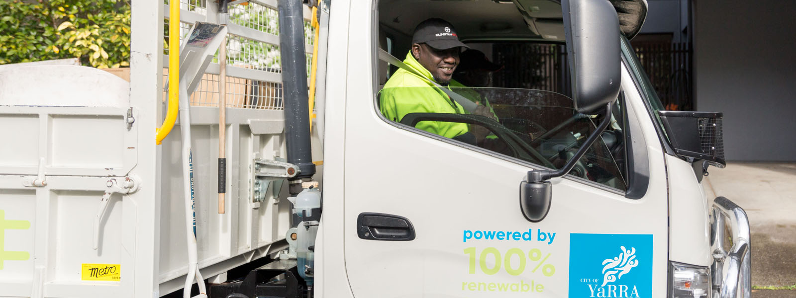 Council waste truck with smiling driver