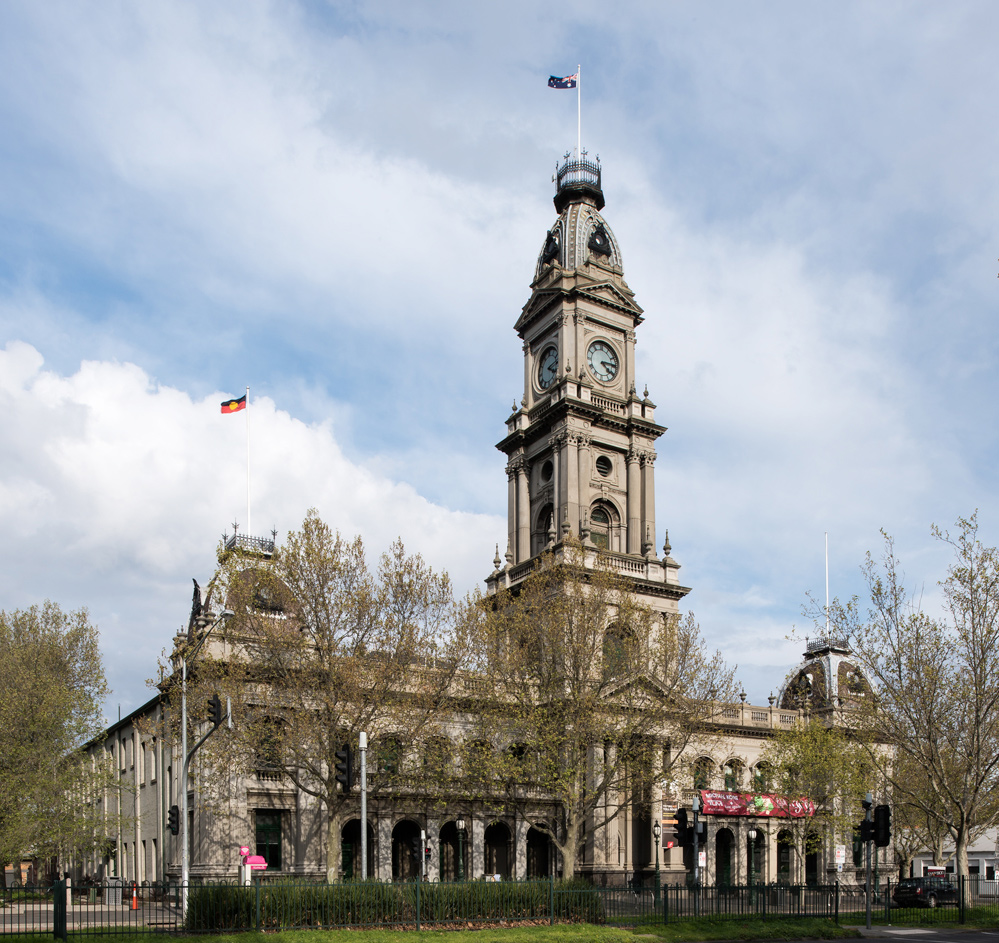 An image of Collingwood Town Hall set against a partly cloudy sky