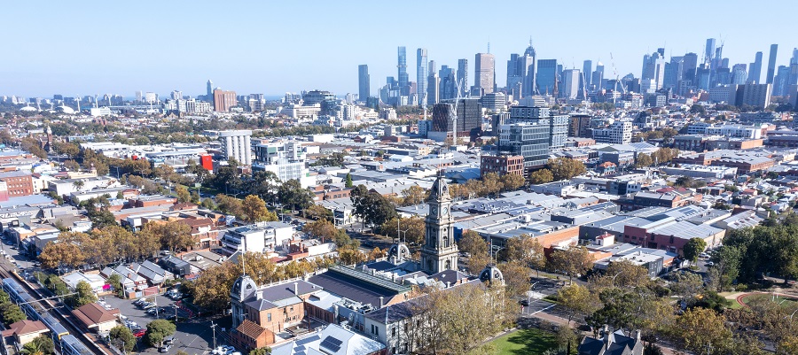 Drone image of Collingwood with city in background