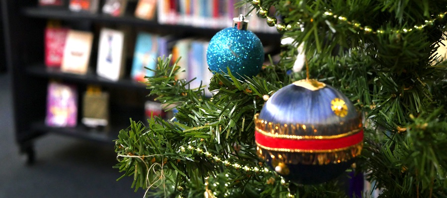 Baubles on a Christmas tree in the library