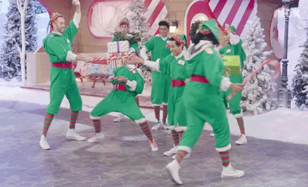 Christmas elves play limbo
