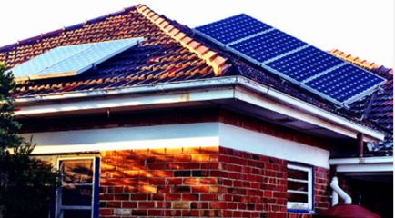 Tiled roof with solar panels