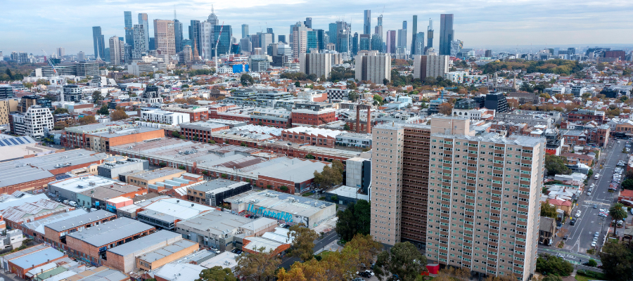 Aerial view of Collingwood and Fitzroy with CBD cityscape in background